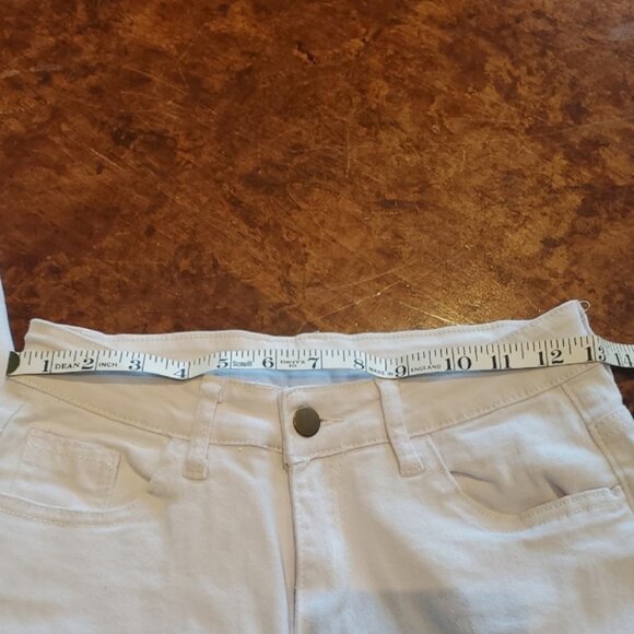 White Skinny HighWaisted Jeans with Distressed Details - Picture 7 of 9